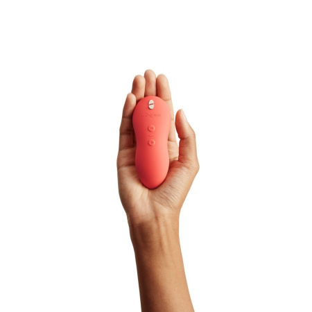 WVI_TouchX_coral_product_image_with_hand_2_tif_result